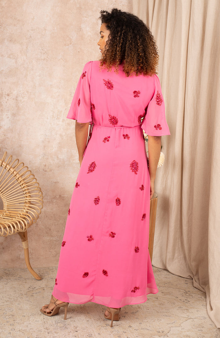 THE HEBE EMBELLISHED WRAP DRESS WITH TIE WAIST AND FLUTTER SLEEVE (PINK/RED)