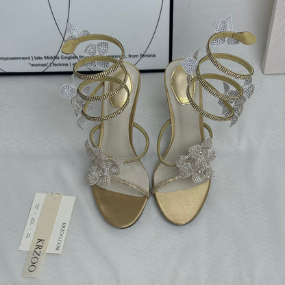 Floral snake-shaped strappy sandals