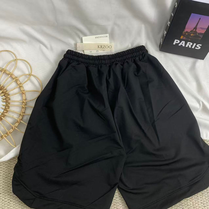 Graffiti-Print Wide-Leg Shorts
