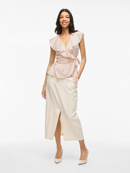 Kimberly Wrap Top (Peach Whip/Black Dots)